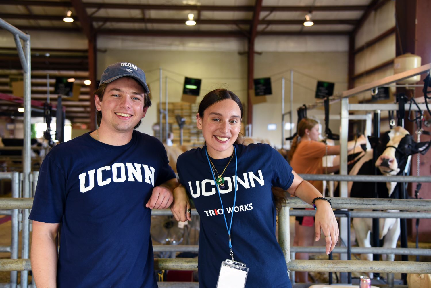 students pose in milking barn